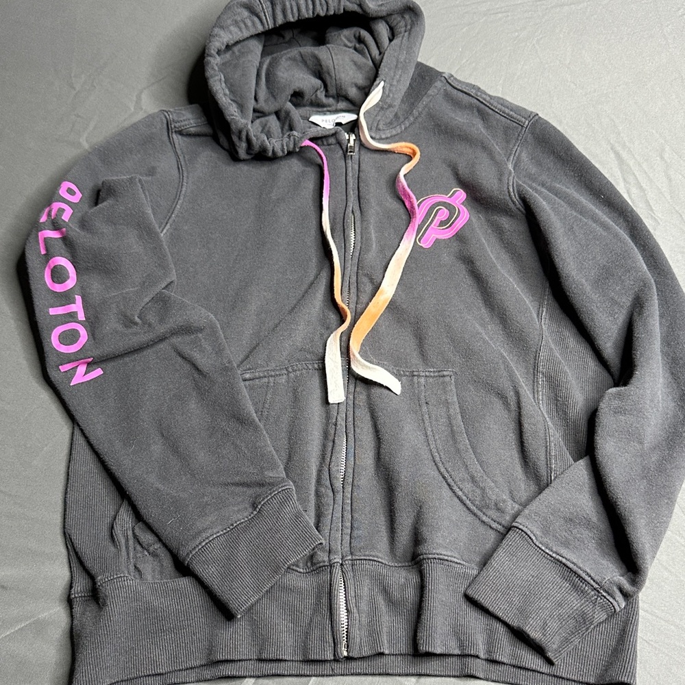 Peloton Ultimate Charcoal Zip Hoodie with Pink & Orange Accents double logo